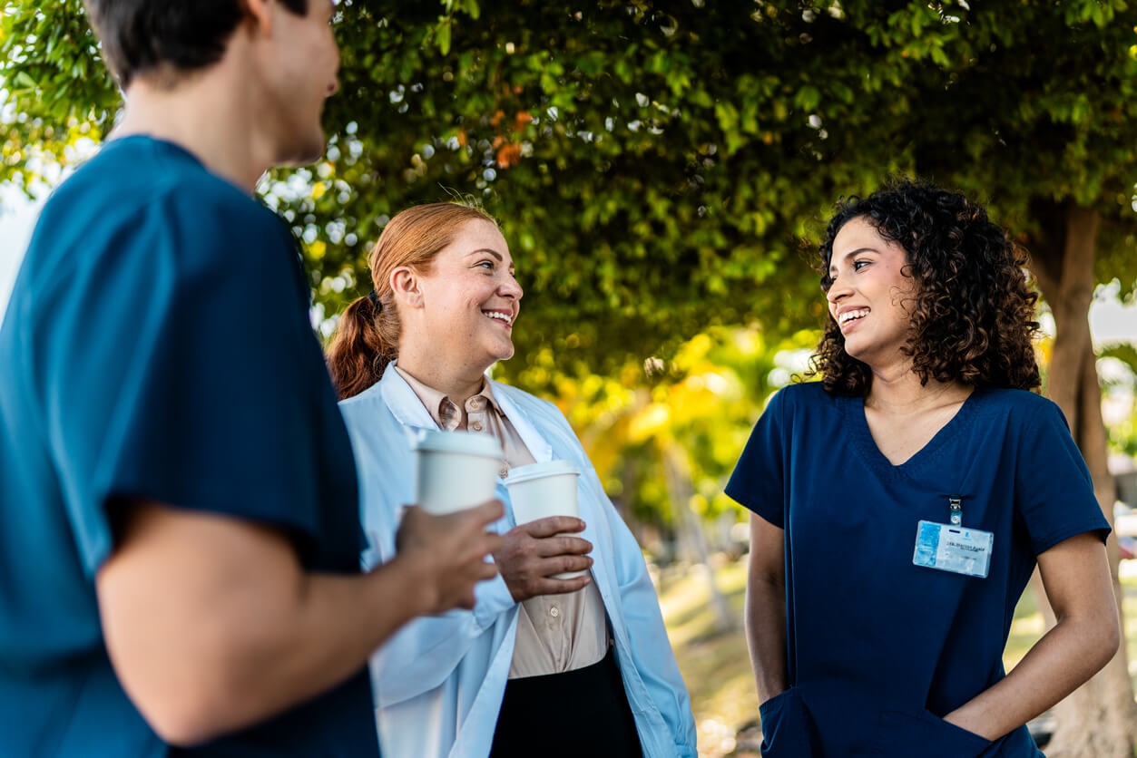 three nurses having a coffee together