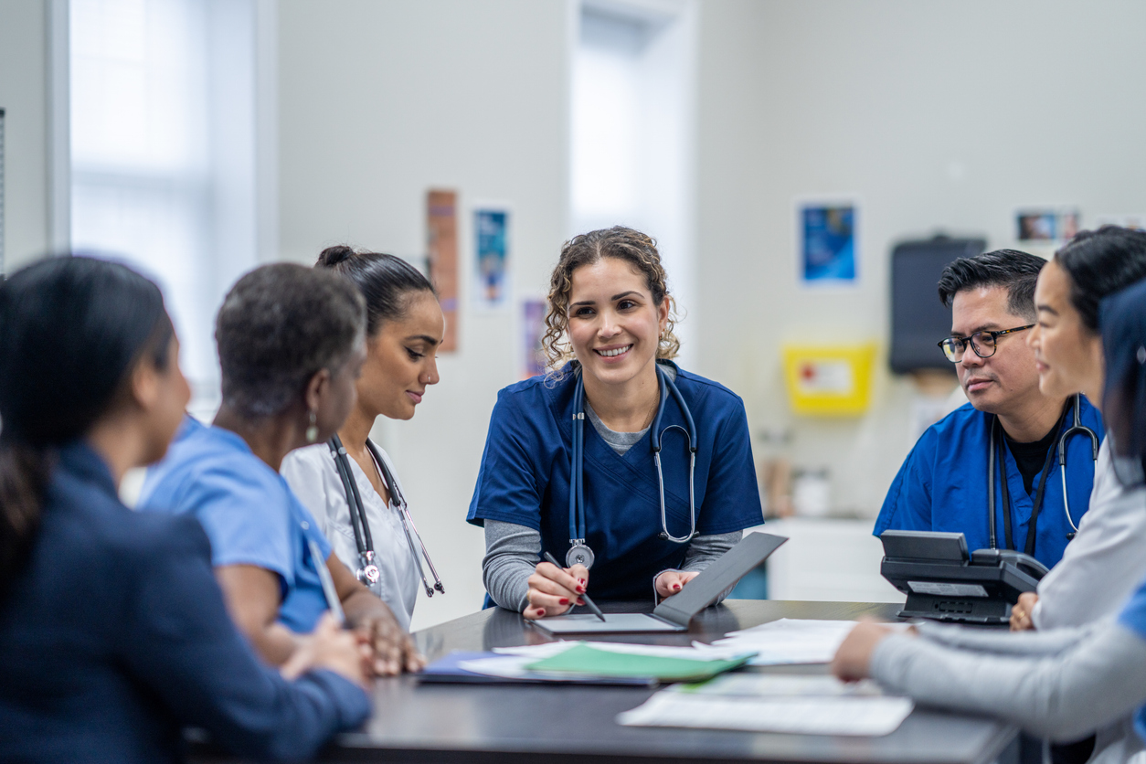 group of nurses having a meeting
