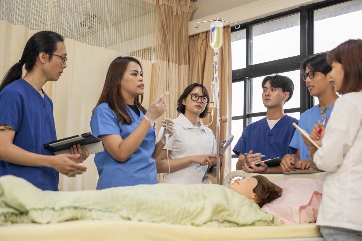 nurse educating students