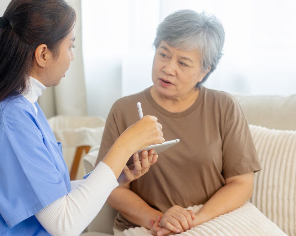 nurse talking to patient